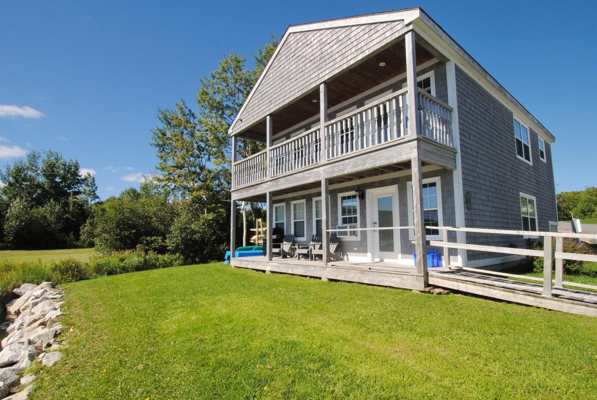 Keltic Quay Cottages & Bayfront Lodge Whycocomagh Extérieur photo